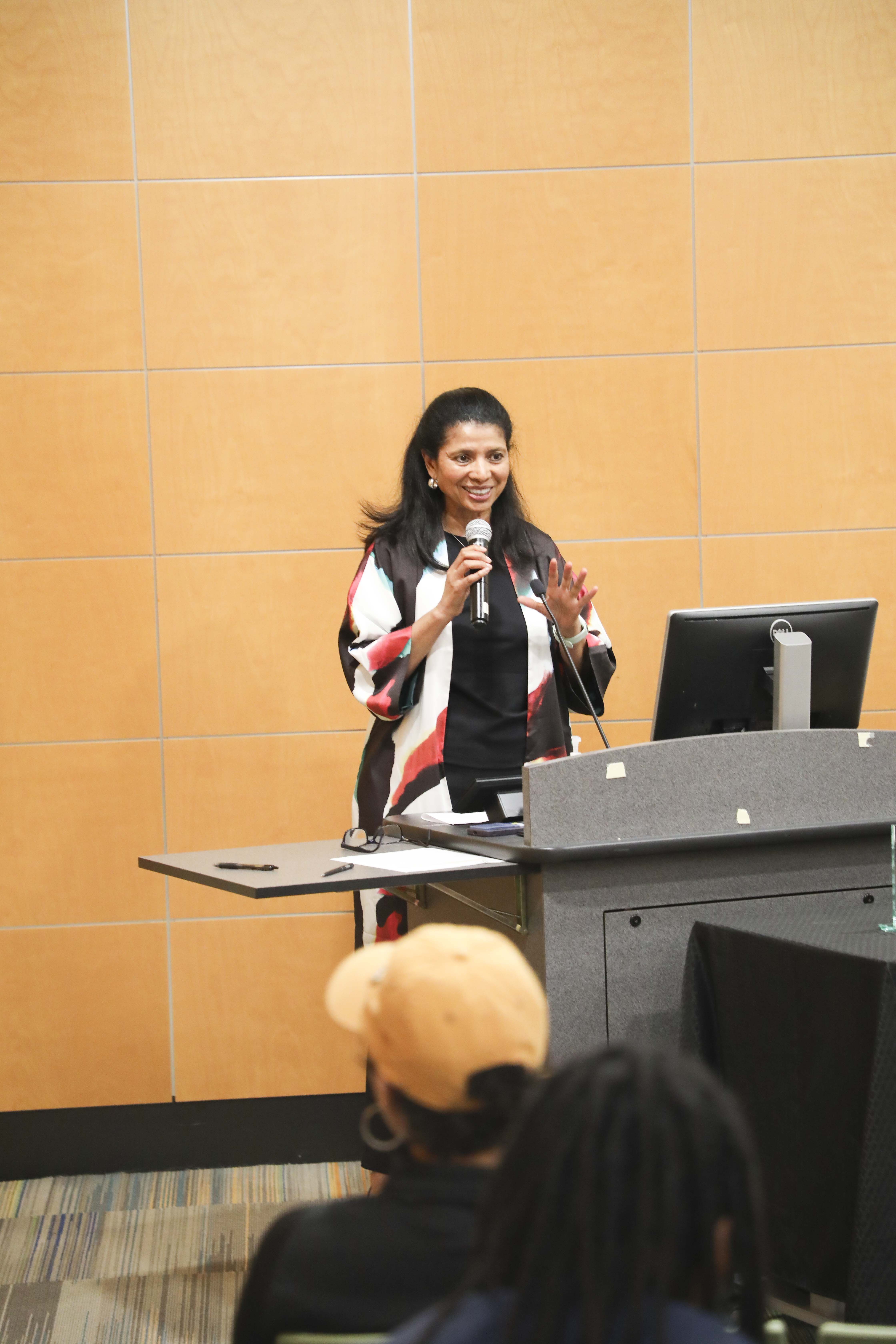 woman talking in a mircrophone