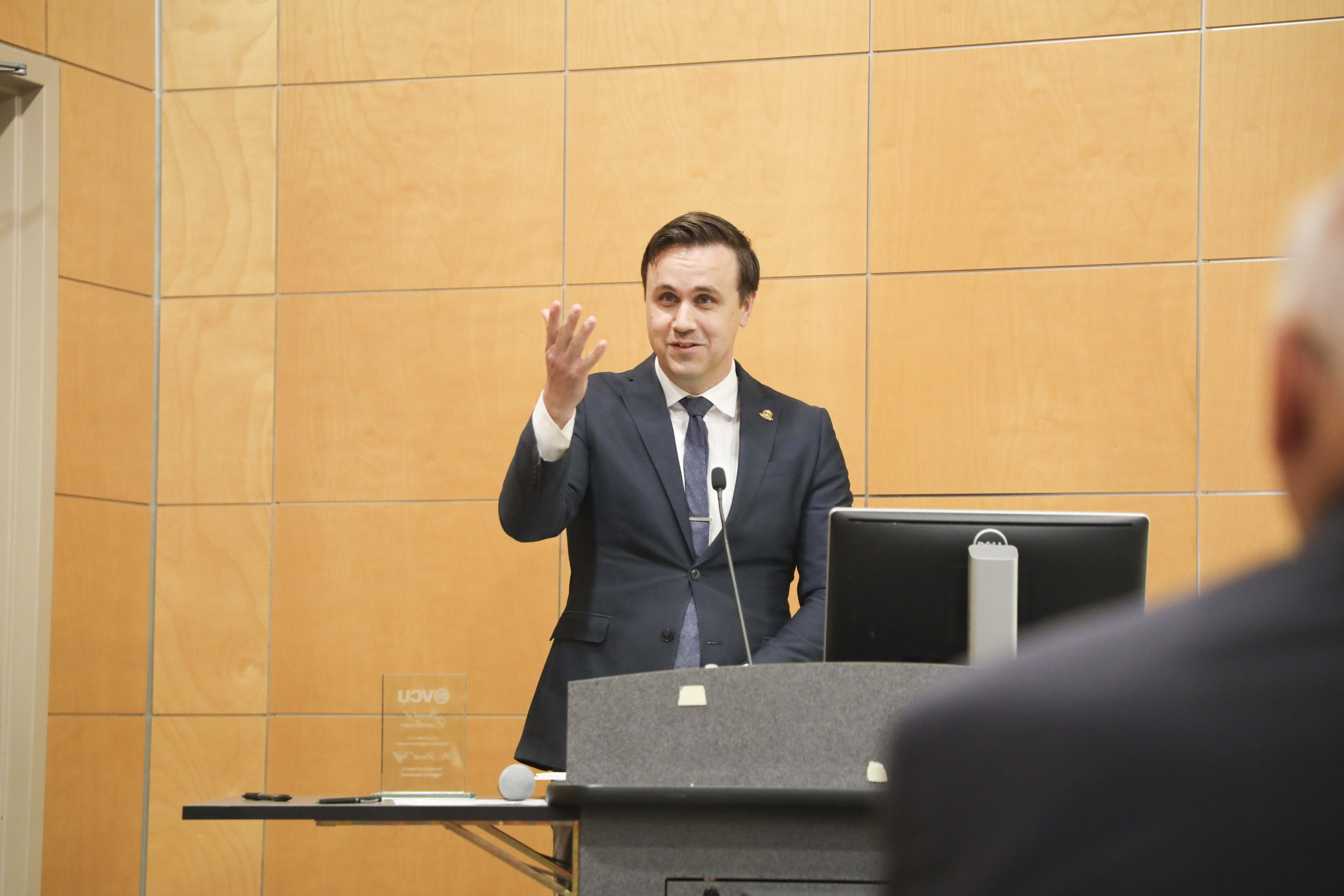 man speaking into microphone