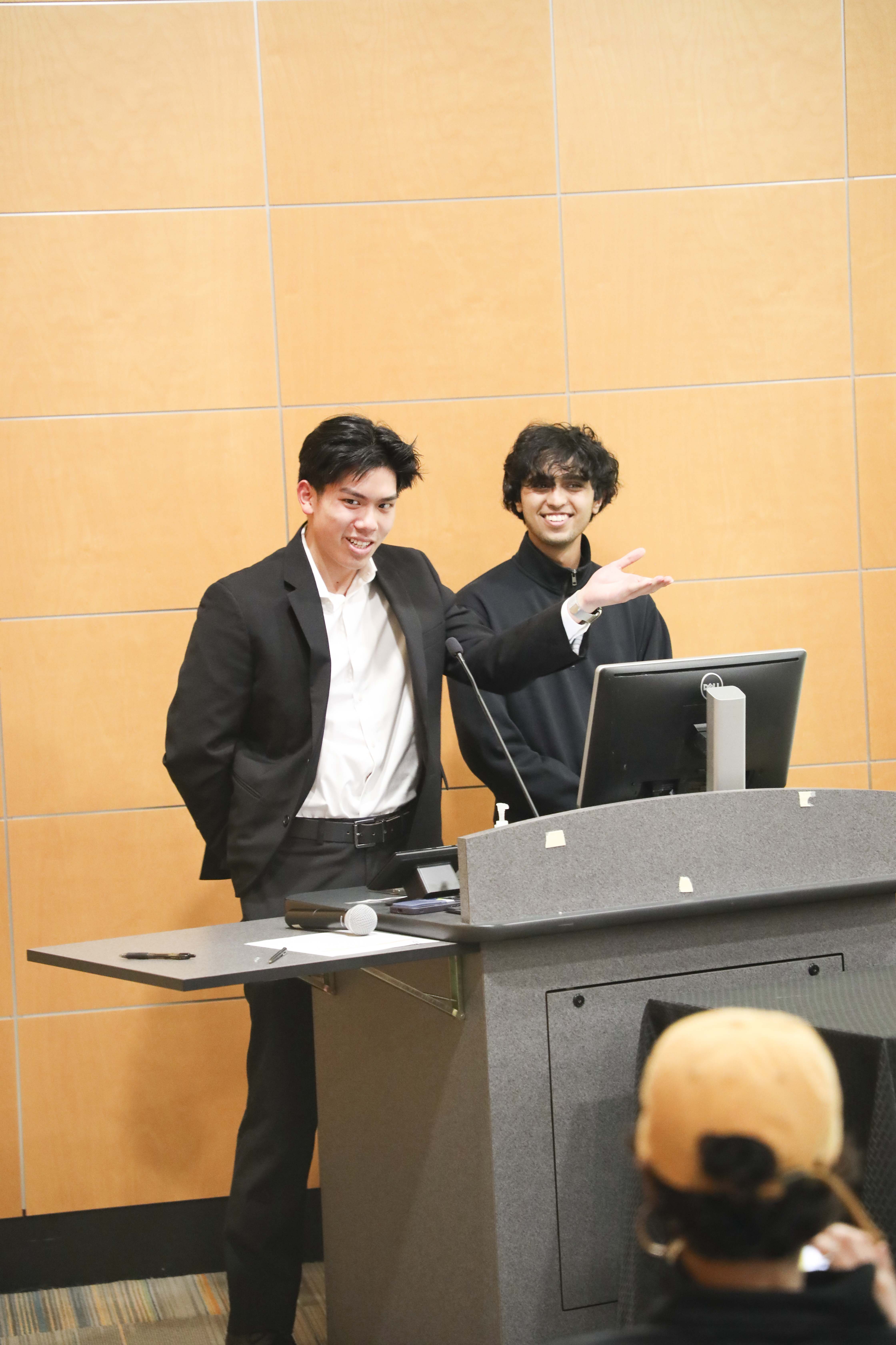 students talking to crowd