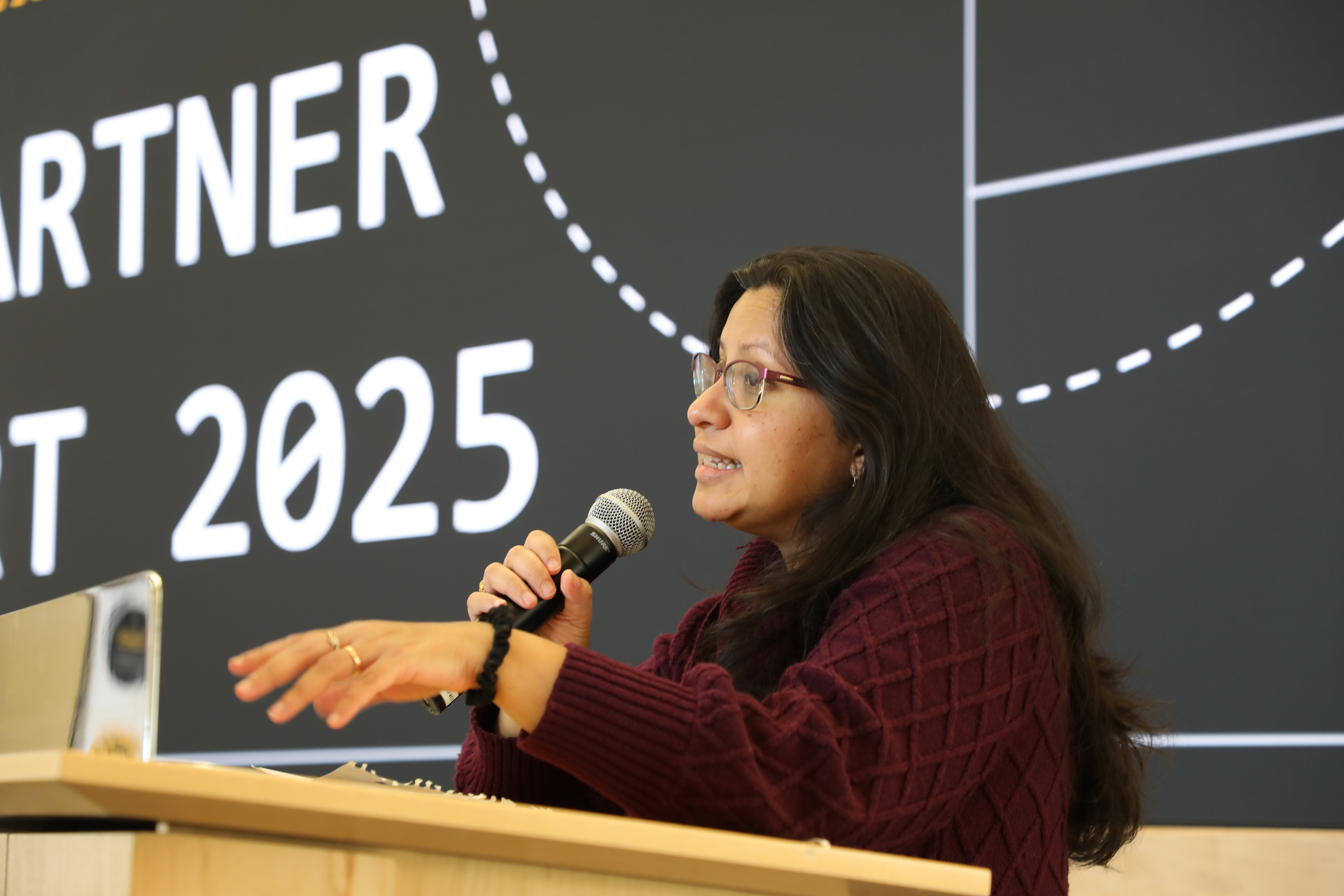 woman standing at a podium