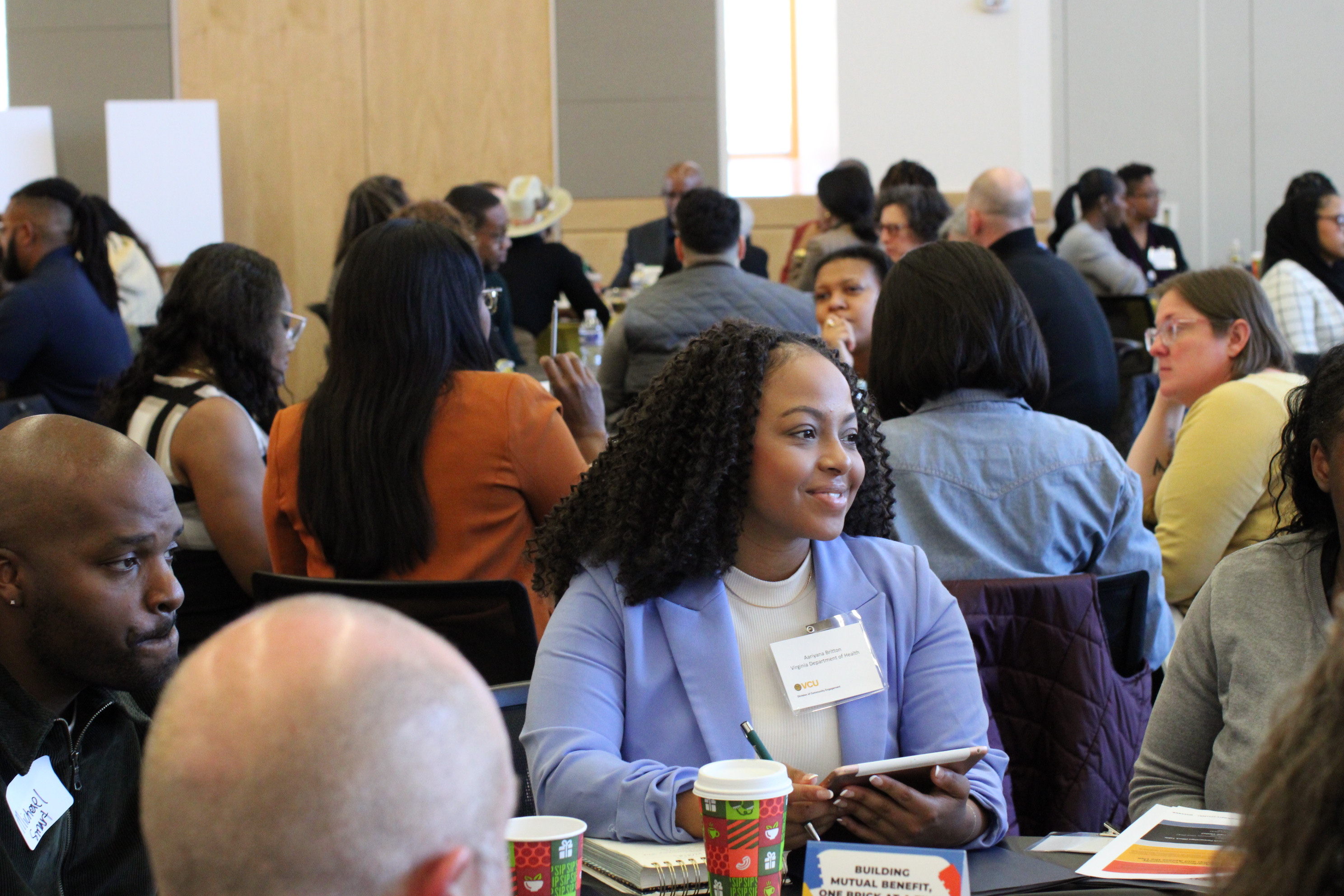 A woman talking at a table