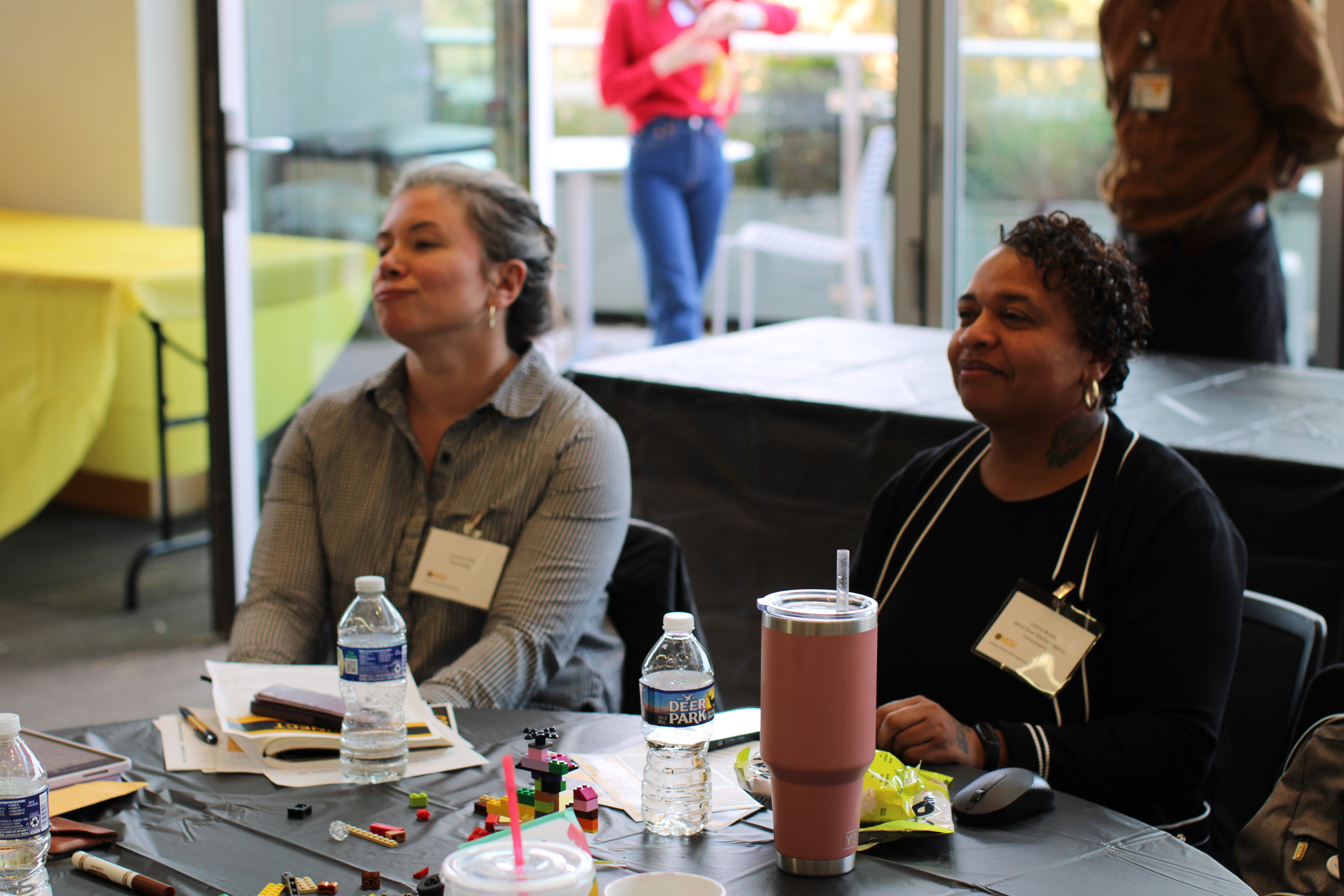 two people looking ahead