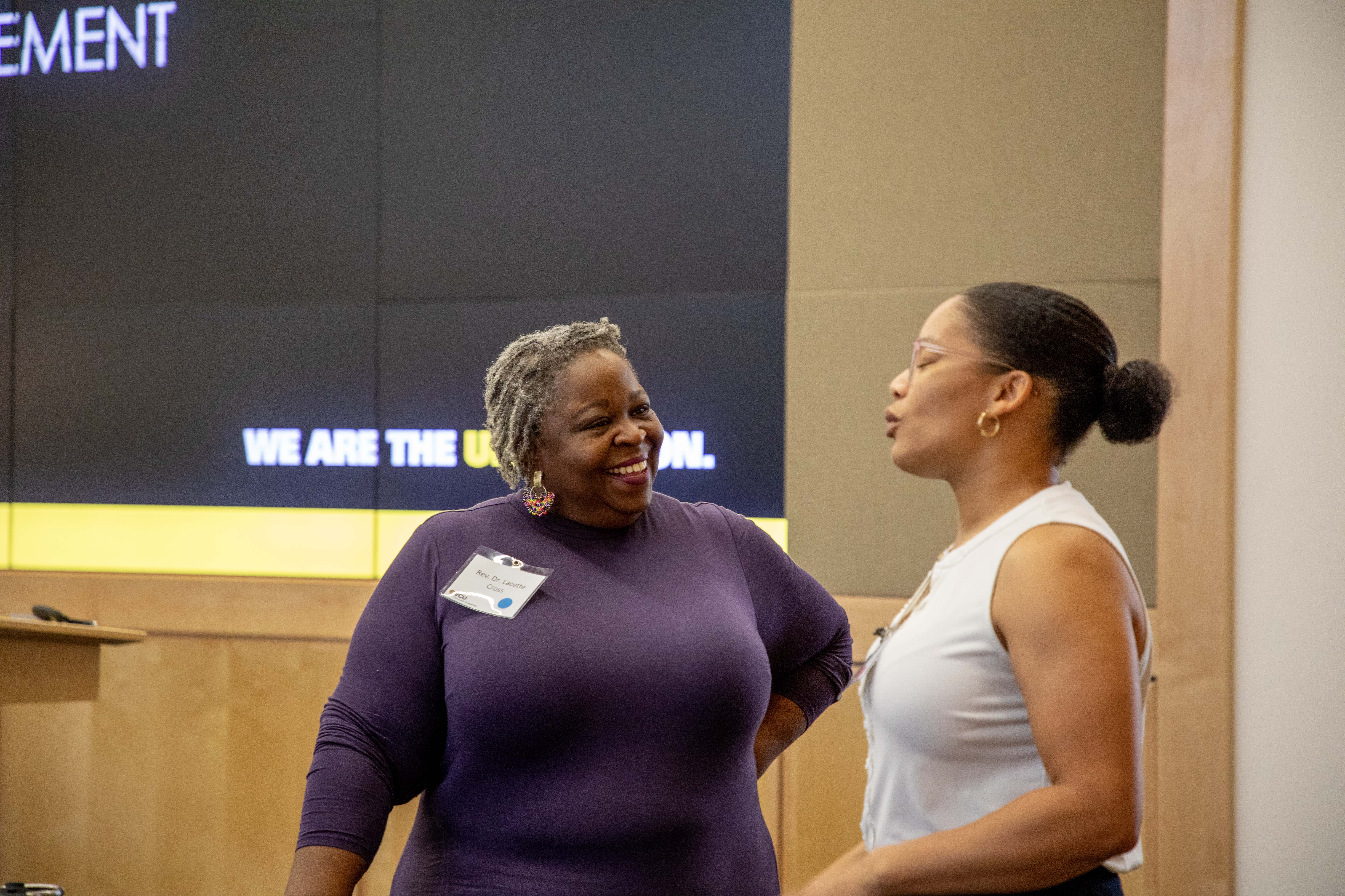 two women speaking