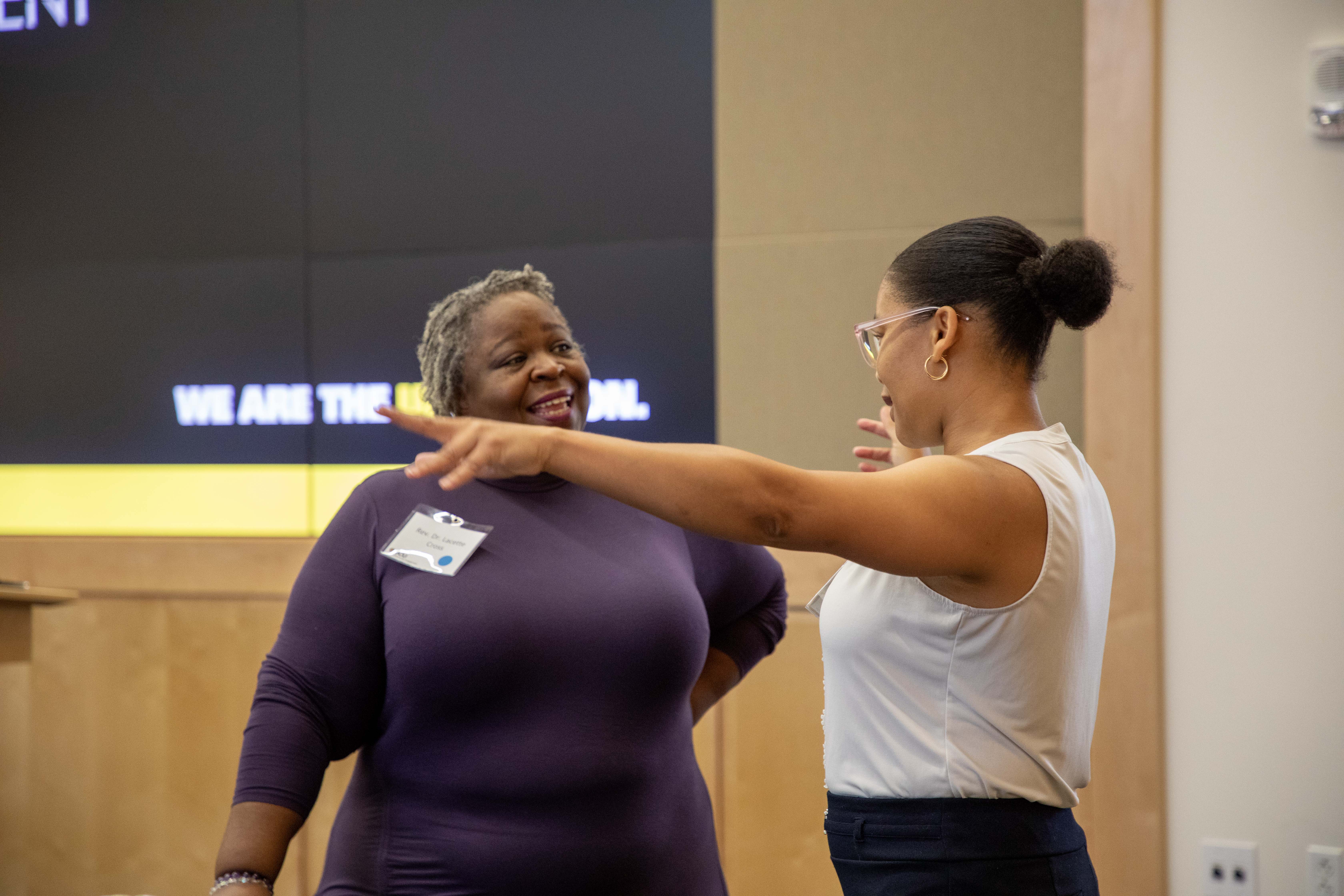 Two women speaking